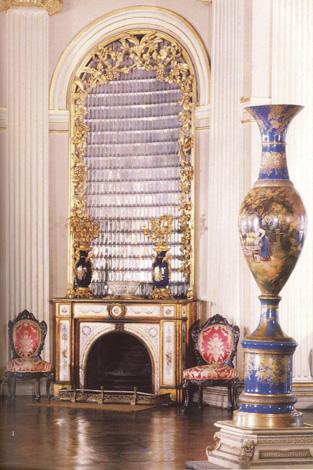 A Fireplace in main entrance hall and a Yildiz vase signed by Halit
